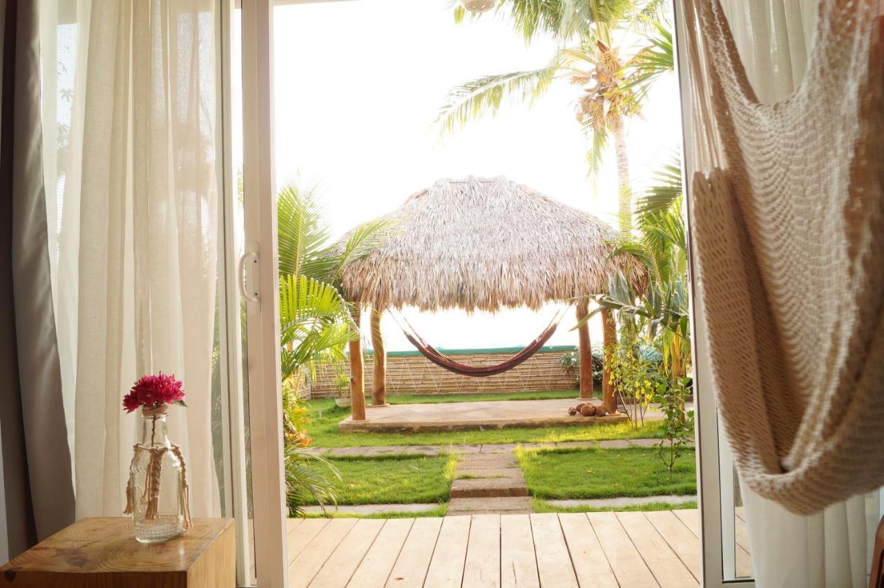 Alive Beach House Transito Luaran gambar